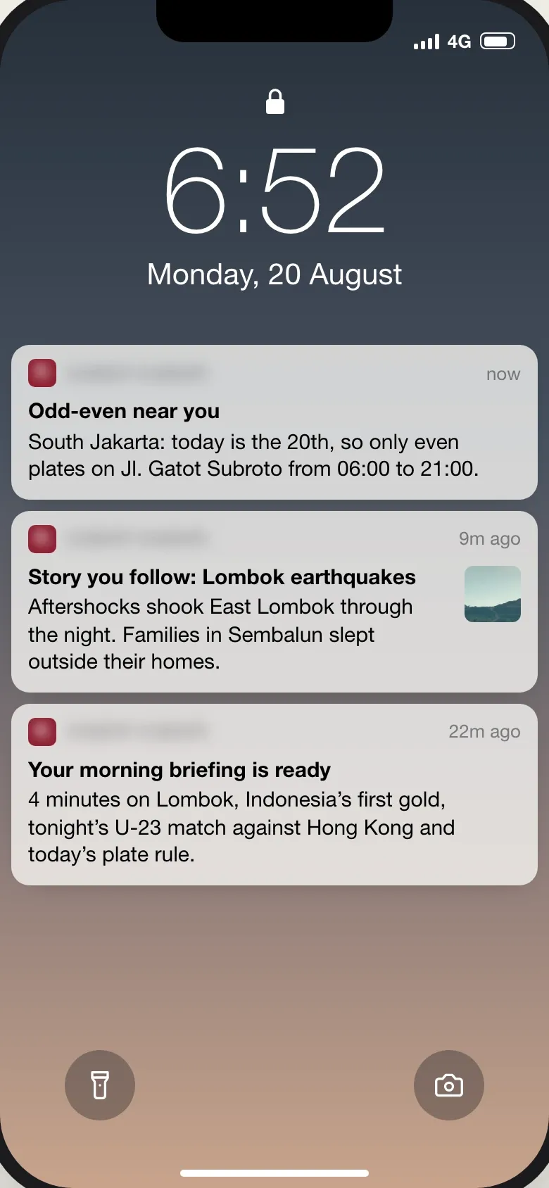 Phone lock screen with three alerts from the news app: the odd-even plate rule near the reader in South Jakarta, aftershocks in the followed Lombok earthquakes story, and the morning briefing ready to play